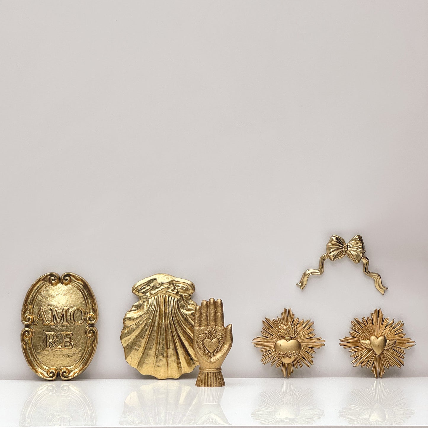 Déco main Ex-voto doré L7 P3,5 H16cm