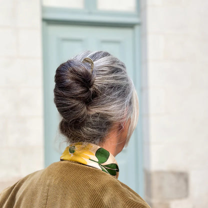 Pic à chignon doré