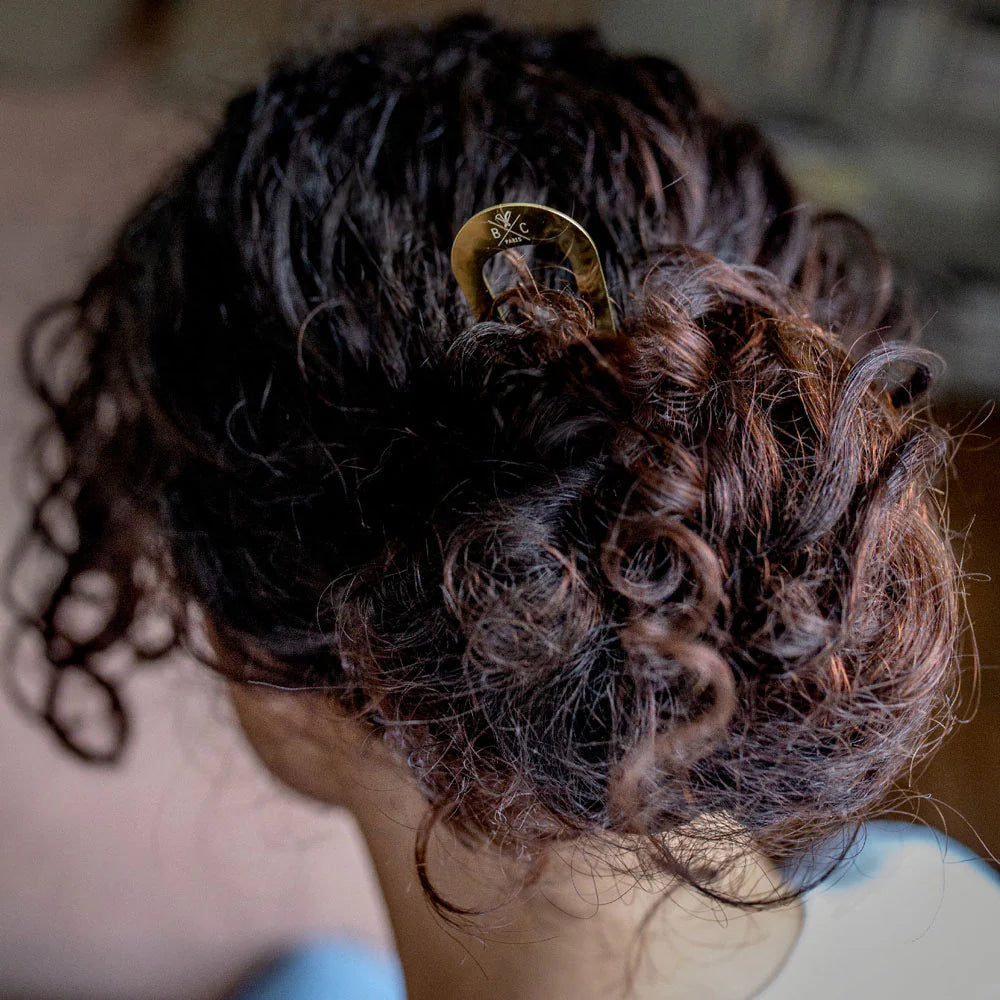 Pic à chignon doré