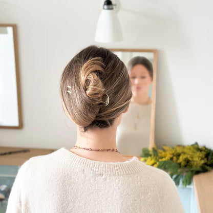 Pic à chignon doré