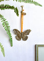 Papillon en laiton