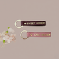 Porte-clé cuir  sweet home / chez nous: Vieux rose